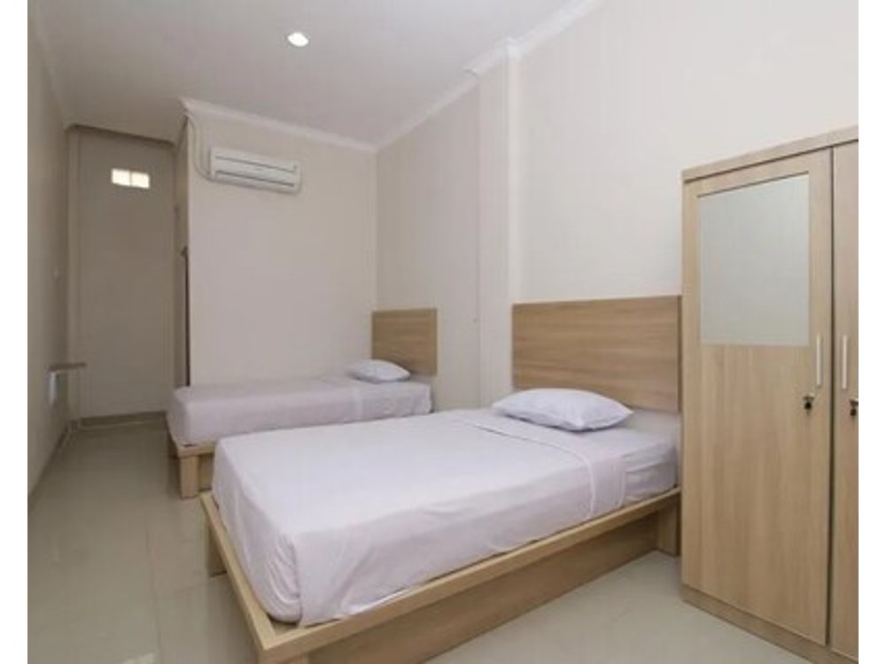 RedDoorz near Jalan Kolonel Haji Burlian Palembang