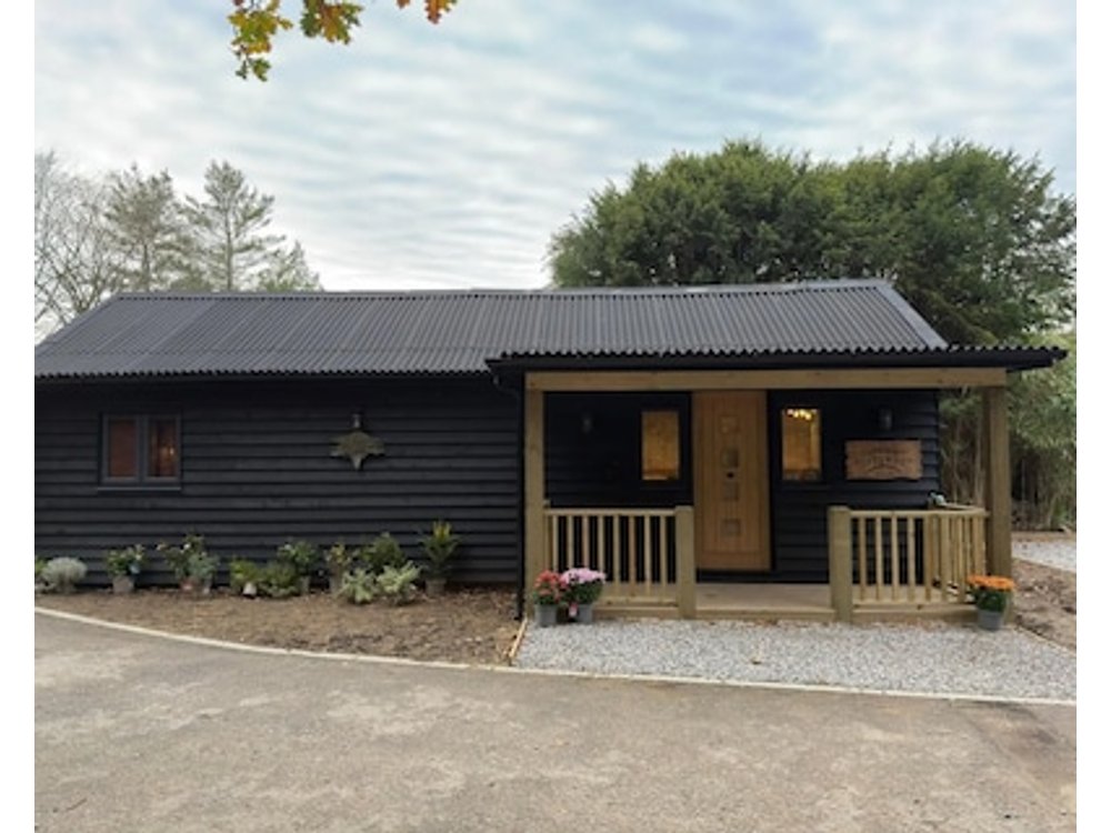 A charming cottage nestled in a peaceful woodland