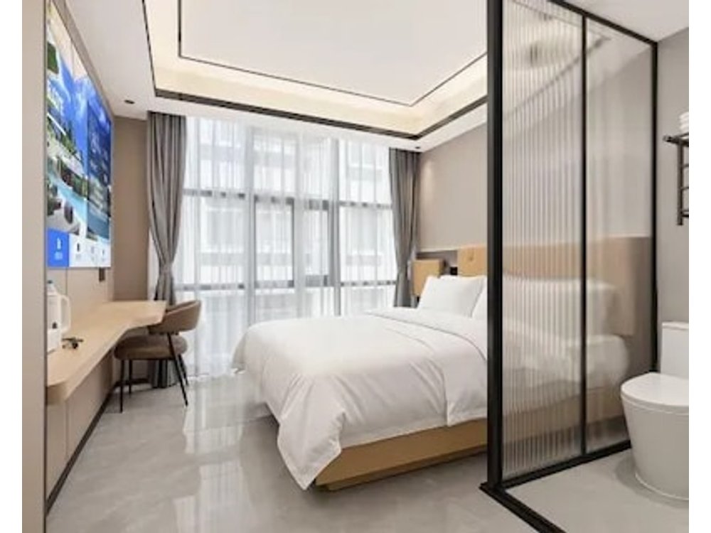 Moomian Bay Audio-Visual Apartment Hotel (World Window Baishizhou Metro Station Branch)
