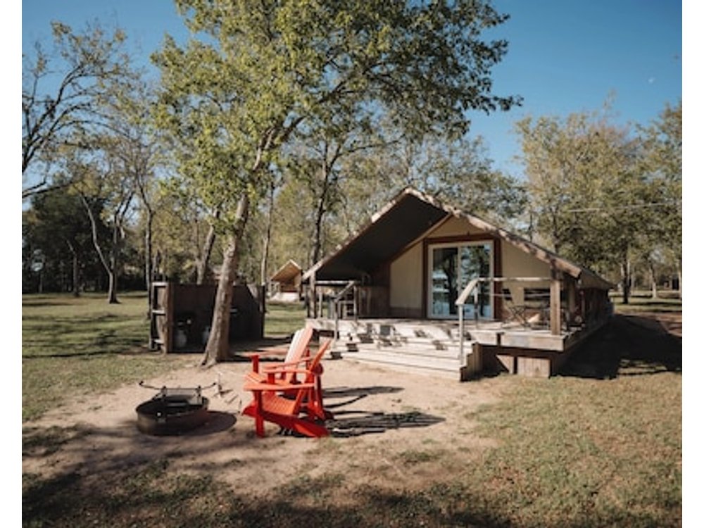 Tranquil Lakefront Glamping Safari Tent with Scenic Views near Bastrop Texas