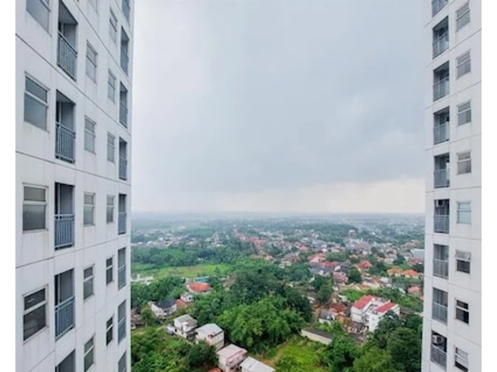 Enjoy Living and Warm Studio at Serpong Garden Apartment By Travelio