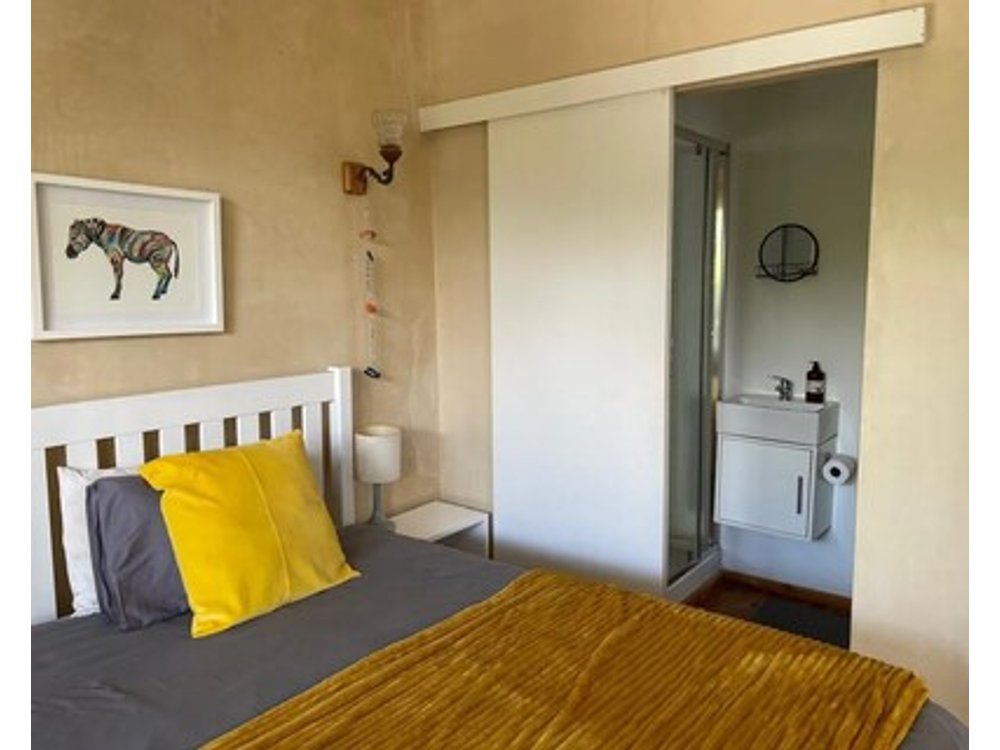 Garden Cottage with Hot Tub in beautiful eco village - 5 mins walk to the beach