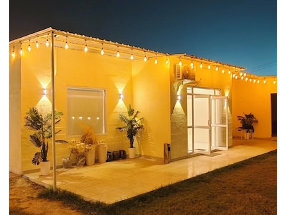 Cozy 4-bedroom cottage in enchanting Gurugram with AC swimming pool open bar dj