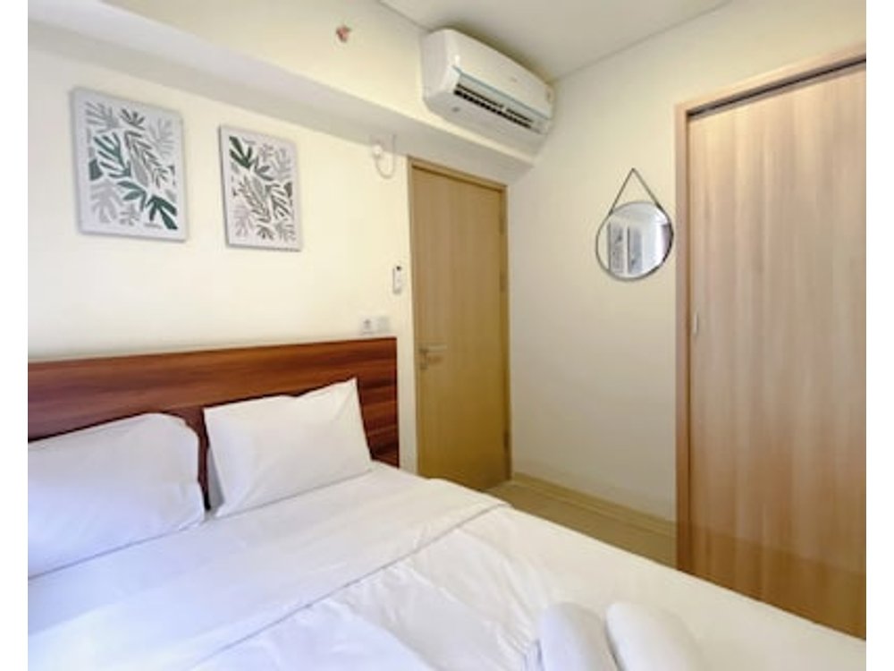 Homey 2br With Work Space At Meikarta Apartment