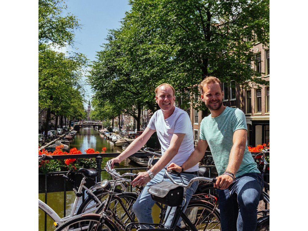 Amsterdam PRIVATE Bike Tour With Locals: Bike & Local Snack Included