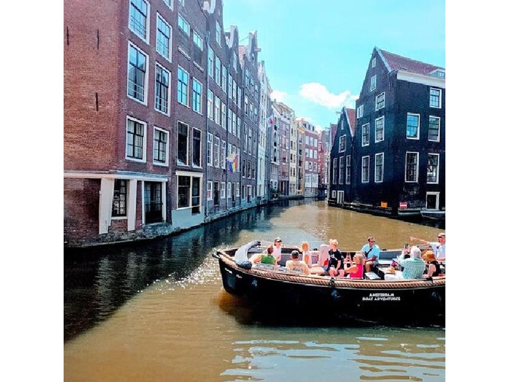 Amsterdam Canal Tour by Open Boat – 90 min Small Group Experience