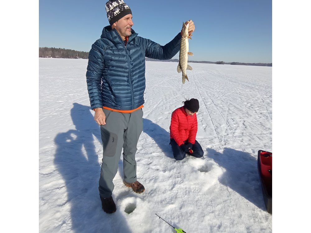 Ice fishing experience with Backpacker Helsinki Tour