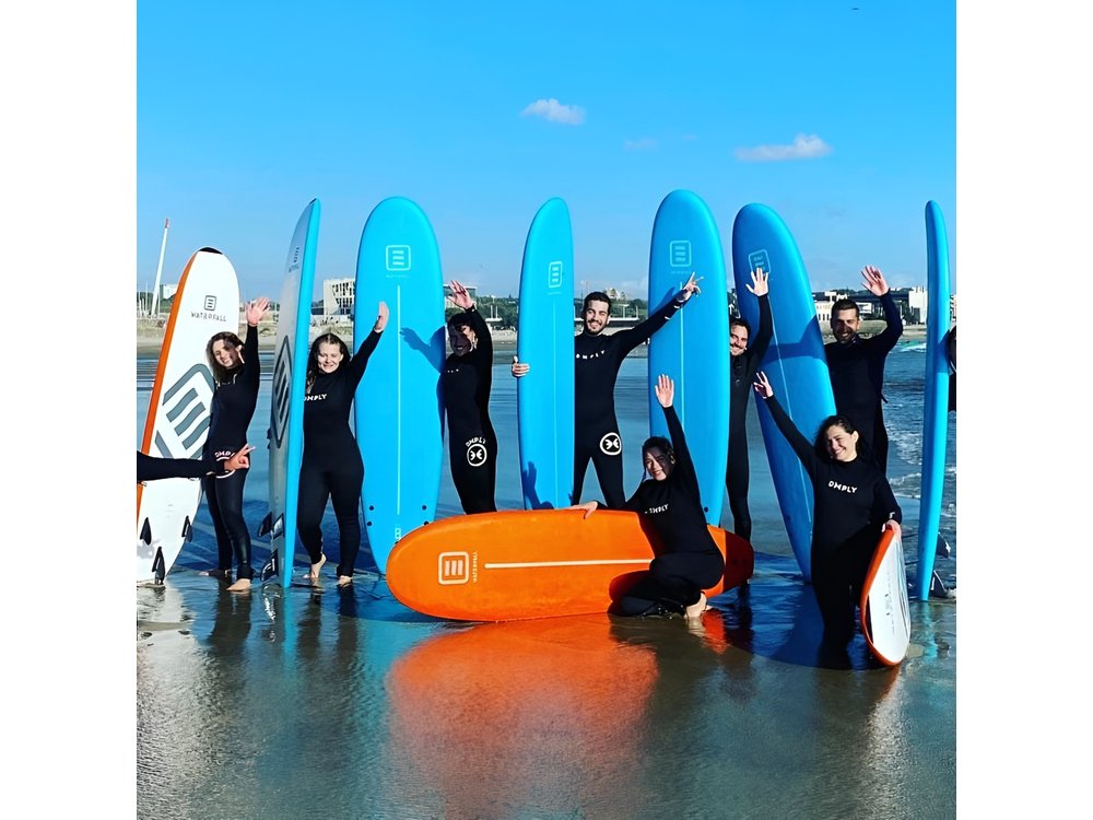 Small Group Surfing Experience with Transportation in Porto