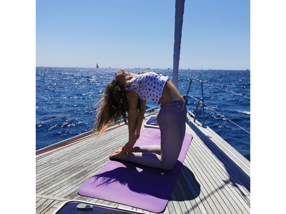 Yoga Session and Sailing Adventure in Barcelona