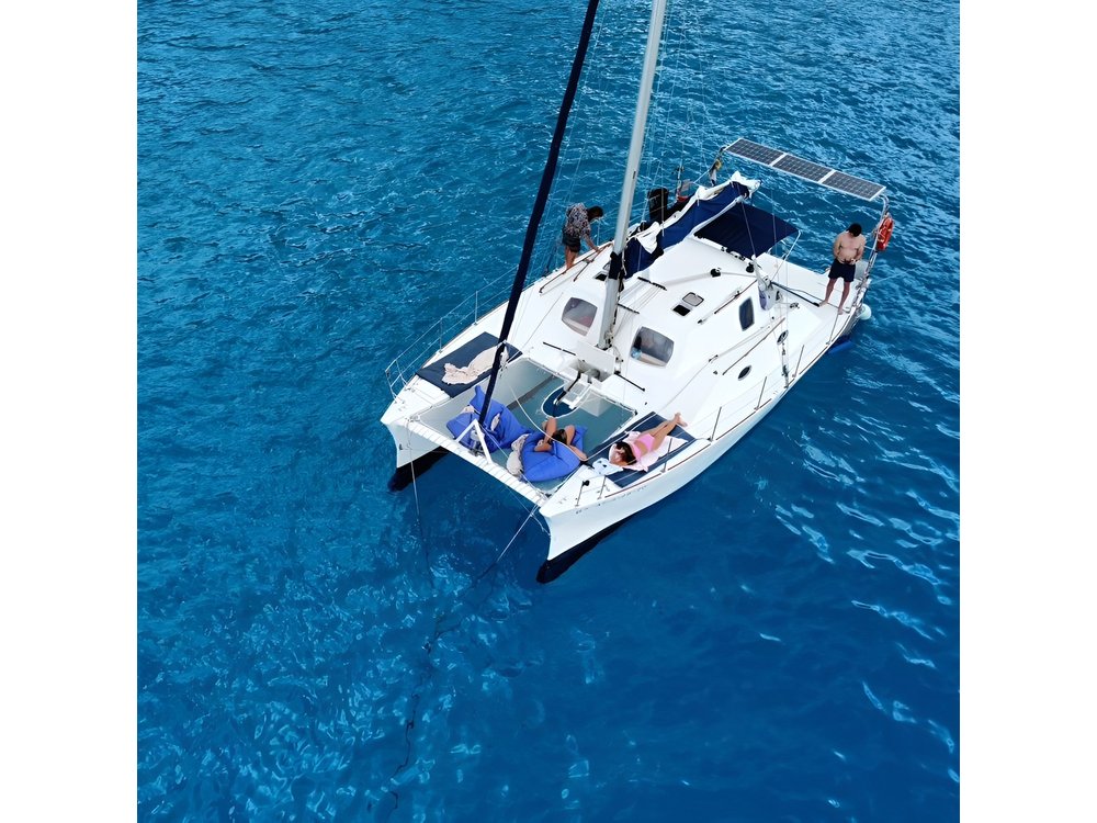 Full Day Trip in Ibiza and Formentera on Board our Catamaran