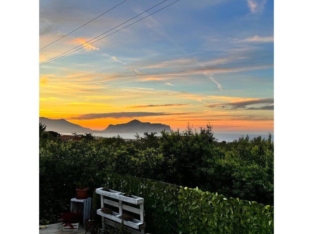 Cooking class in a villa with Palermo view