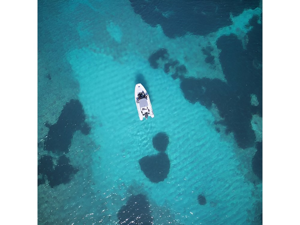 Tour with aperitif and snorkeling in Alghero Capo Caccia Sardinia