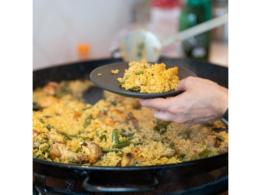 Enjoy your Paella with Purchase to Russafa Market in Valencia