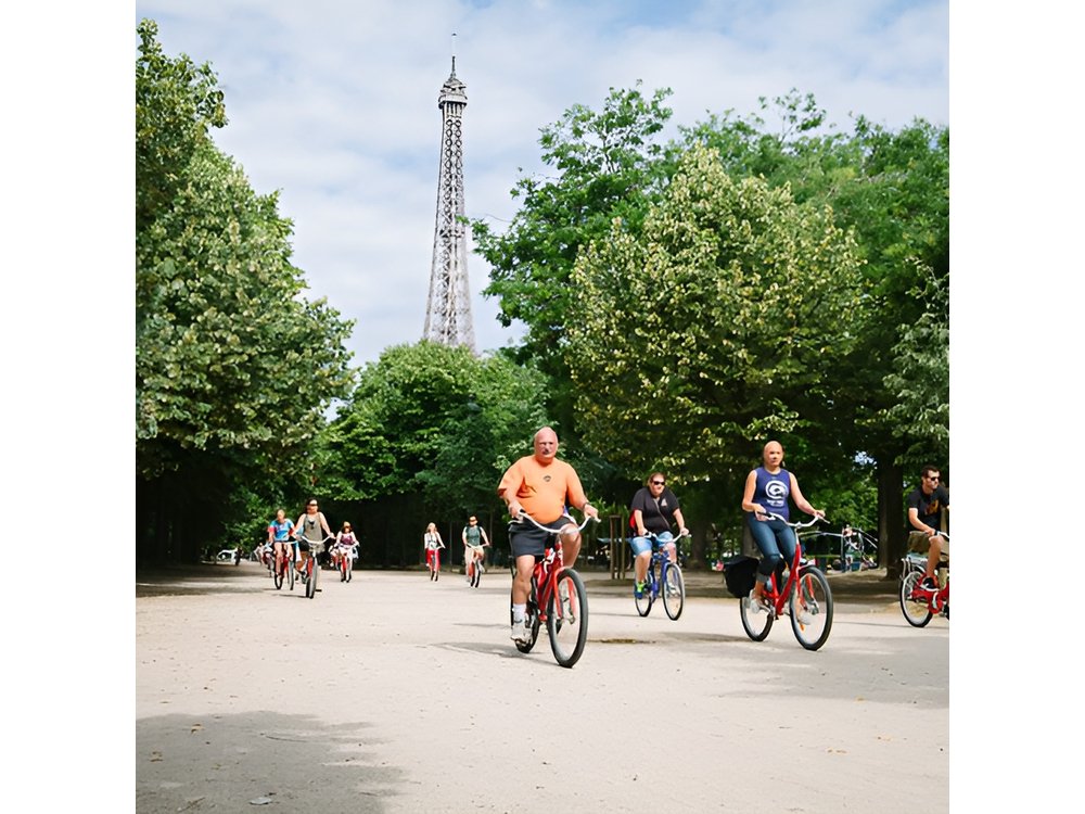 Paris Combo: Highlights Bike Tour & Seine Cruise Experience