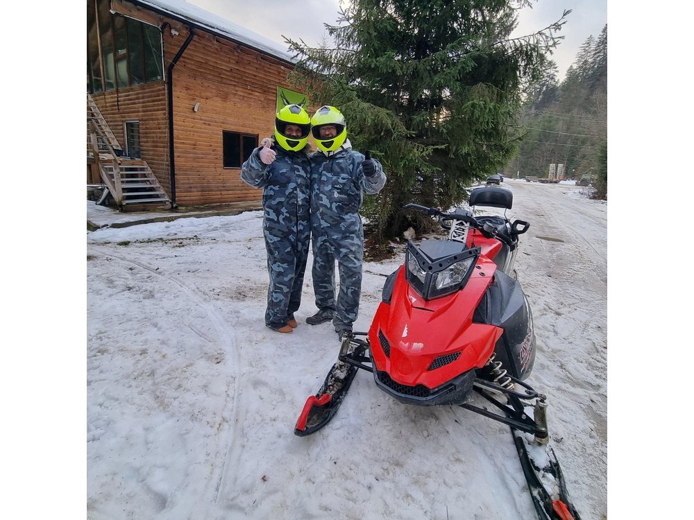 Day Tour from Bucharest-Carpathian Snowmobile Experience
