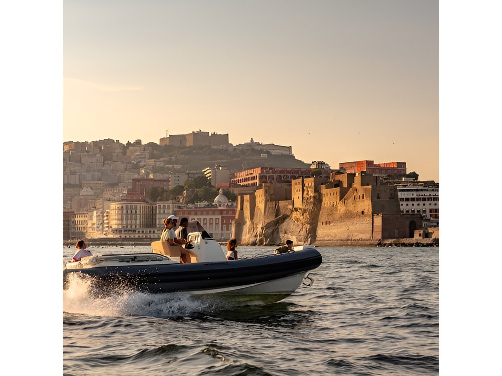 Aperitif on a boat at sunset in the Gulf of Naples