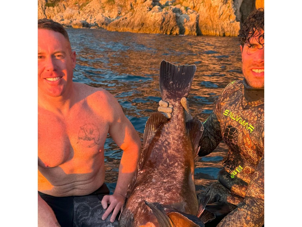 Sub Fishing And Snorkeling In The Waters Of Capri