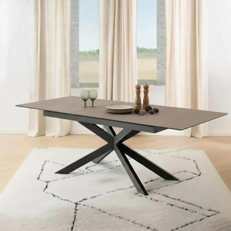 Photo 1 of Irwine extending dining table - 6-8 seater - 168cm-210cm - rusty brown ceramic - with star legs Photo 1 of Irwine extending dining table - 6-8 seater - 168cm-210cm - rusty brown ceramic - with star legs