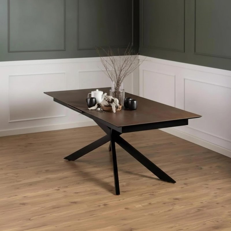 Photo 1 of Irwine extending dining table - 8-10 seater - 200cm-240cm - rusty brown ceramic - with star legs Photo 1 of Irwine extending dining table - 8-10 seater - 200cm-240cm - rusty brown ceramic - with star legs