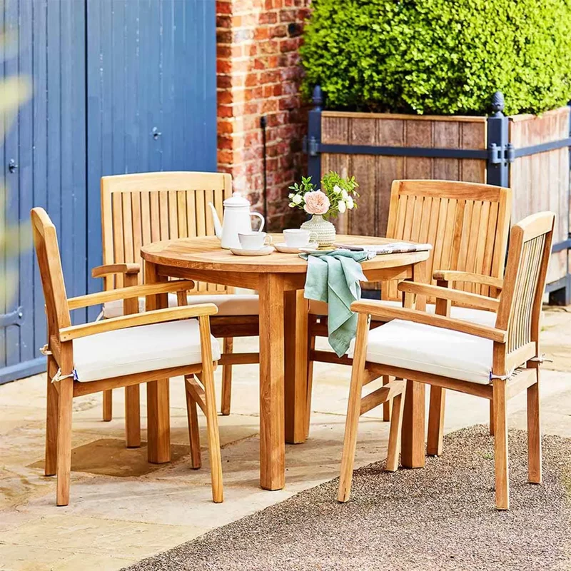 Photo 1 of Churn outdoor teak table 100cm and 4 henley stacking chairs Photo 1 of Churn outdoor teak table 100cm and 4 henley stacking chairs