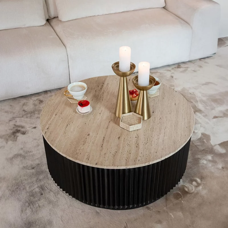 Photo 1 of Hampton travertine beige top round coffee table with black fluted base Photo 1 of Hampton travertine beige top round coffee table with black fluted base