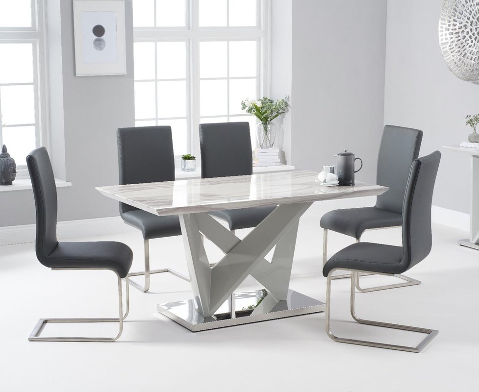 Photo of Marcella 150cm marble effect high gloss light grey dining table with 4 black austin chairs Photo of Marcella 150cm marble effect high gloss light grey dining table with 4 black austin chairs