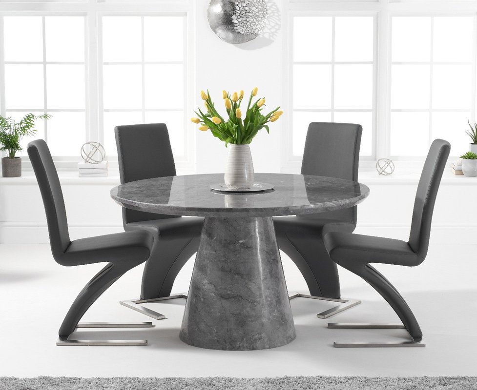 Photo of Ravello 130cm round grey marble dining table with 4 white aldo chairs Photo of Ravello 130cm round grey marble dining table with 4 white aldo chairs