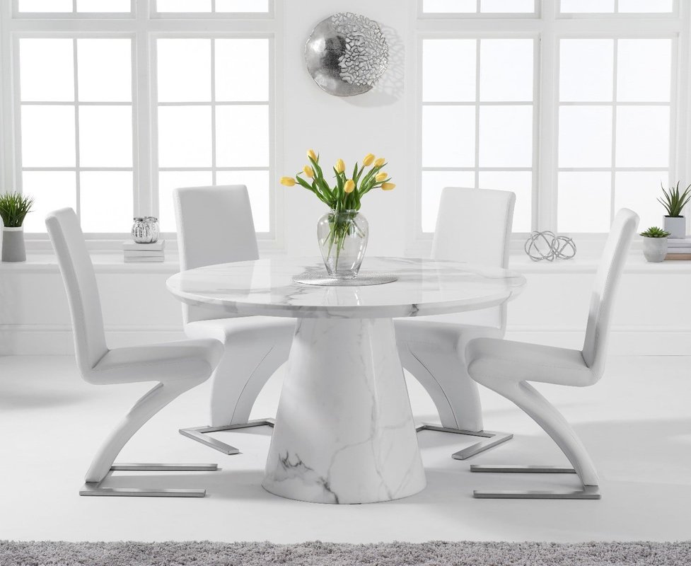Photo of Ravello 130cm round white marble dining table with 6 black aldo chairs Photo of Ravello 130cm round white marble dining table with 6 black aldo chairs