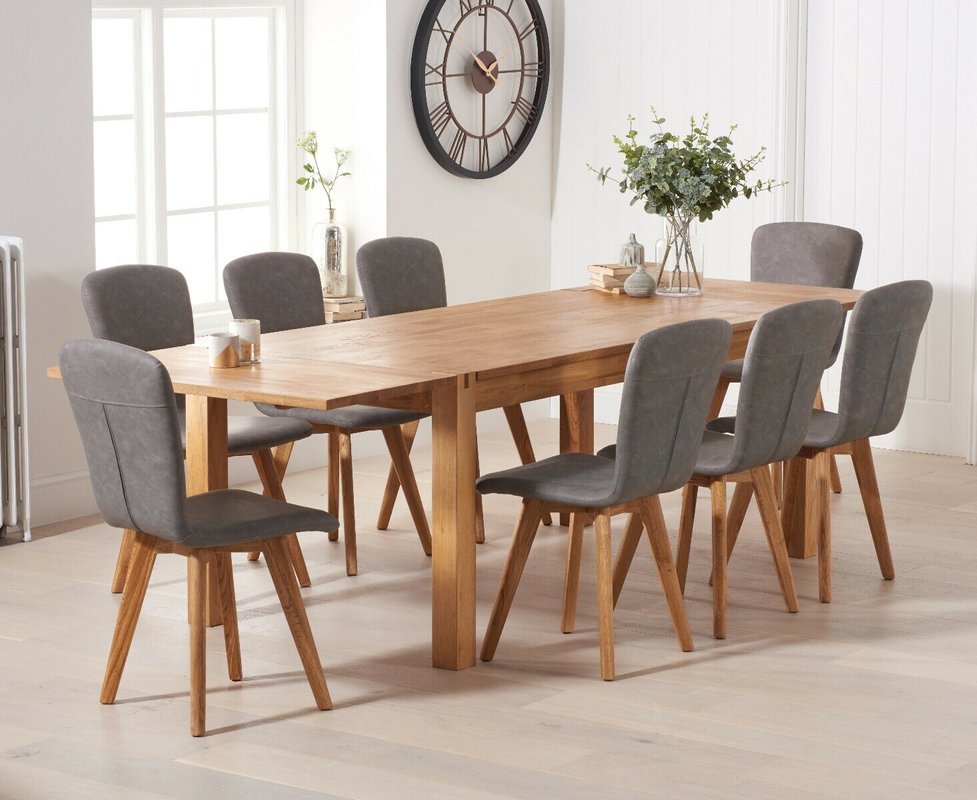 Photo 1 of Extending thetford 150cm solid oak table with 10 grey ruben chairs Photo 1 of Extending thetford 150cm solid oak table with 10 grey ruben chairs