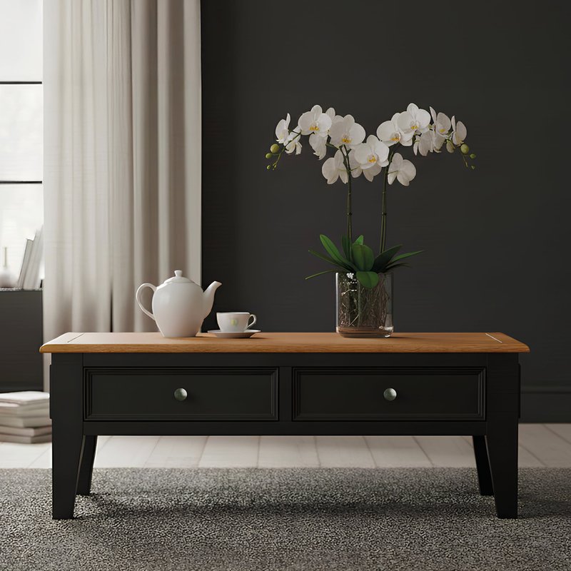 Photo of Charlton oak and black painted 4 drawer coffee table Photo of Charlton oak and black painted 4 drawer coffee table