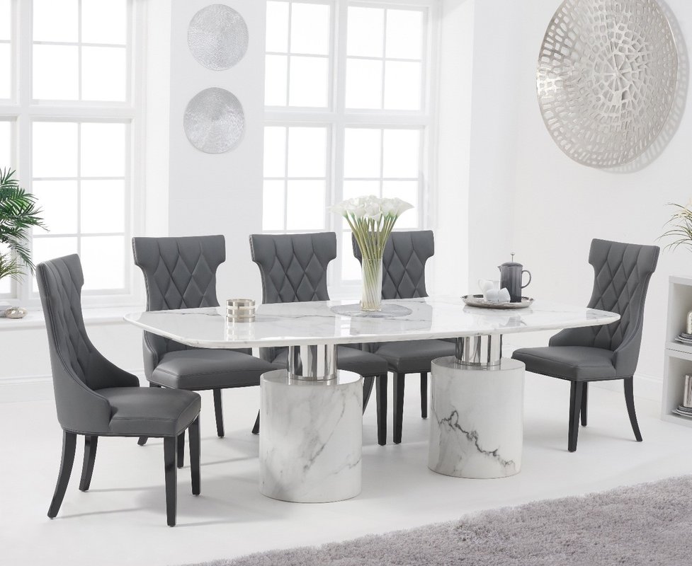 Photo of Antonio 220cm white marble dining table with 10 cream sophia chairs Photo of Antonio 220cm white marble dining table with 10 cream sophia chairs