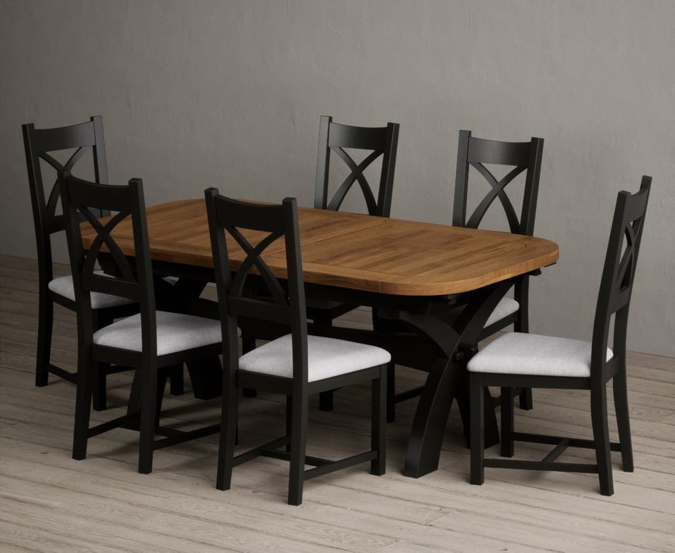 Photo of Extending olympia 180cm oak and black painted dining table with 12 light grey painted chairs Photo of Extending olympia 180cm oak and black painted dining table with 12 light grey painted chairs