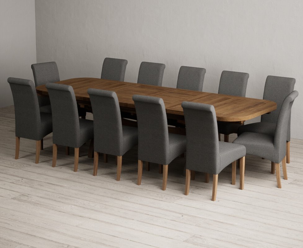 Photo 1 of Extending olympia 180cm rustic solid oak dining table with 12 charcoal grey scroll back chairs Photo 1 of Extending olympia 180cm rustic solid oak dining table with 12 charcoal grey scroll back chairs