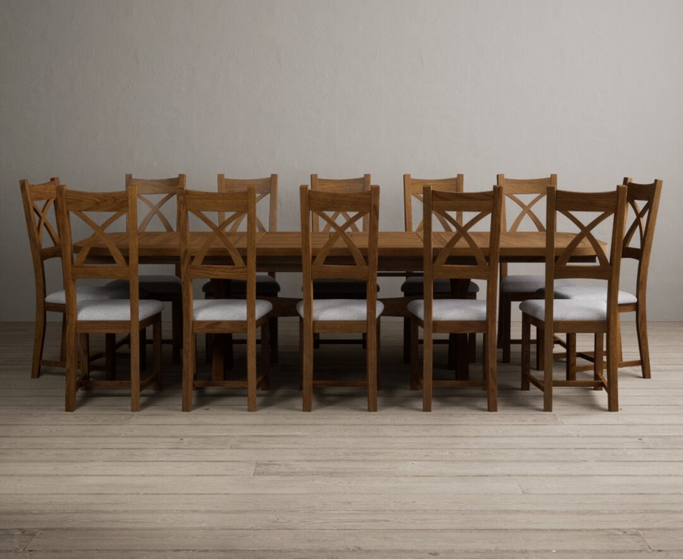 Photo 1 of Extending olympia 180cm rustic solid oak dining table with 12 light grey rustic solid oak chairs Photo 1 of Extending olympia 180cm rustic solid oak dining table with 12 light grey rustic solid oak chairs