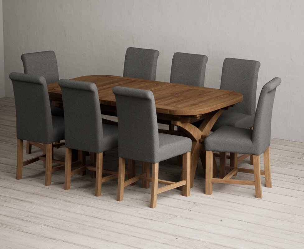 Photo 1 of Extending olympia 180cm rustic solid oak dining table with 8 charcoal grey braced chairs Photo 1 of Extending olympia 180cm rustic solid oak dining table with 8 charcoal grey braced chairs
