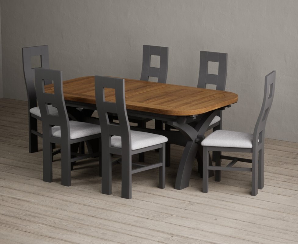 Photo 1 of Extending olympia 180cm oak and charcoal grey dining table with 6 light grey painted chairs Photo 1 of Extending olympia 180cm oak and charcoal grey dining table with 6 light grey painted chairs