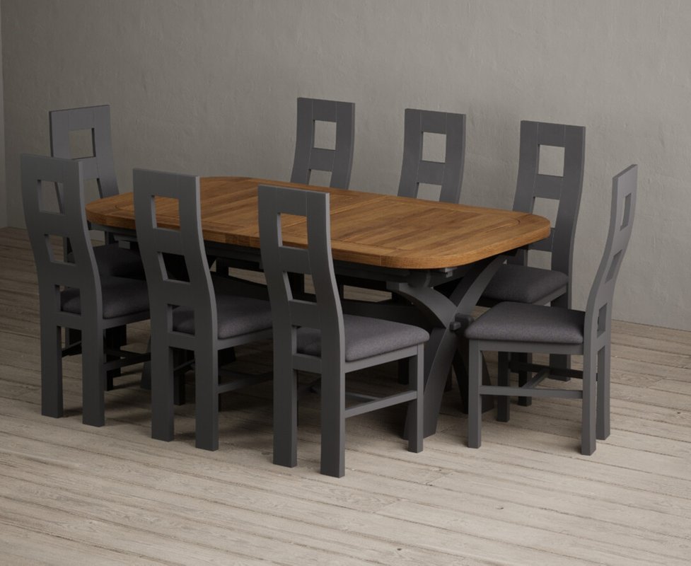 Photo 1 of Extending olympia 180cm oak and charcoal grey dining table with 8 charcoal grey painted chairs Photo 1 of Extending olympia 180cm oak and charcoal grey dining table with 8 charcoal grey painted chairs