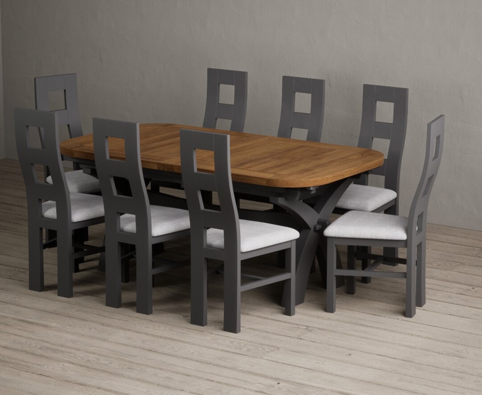 Photo 1 of Extending olympia 180cm oak and charcoal grey dining table with 8 light grey painted chairs Photo 1 of Extending olympia 180cm oak and charcoal grey dining table with 8 light grey painted chairs