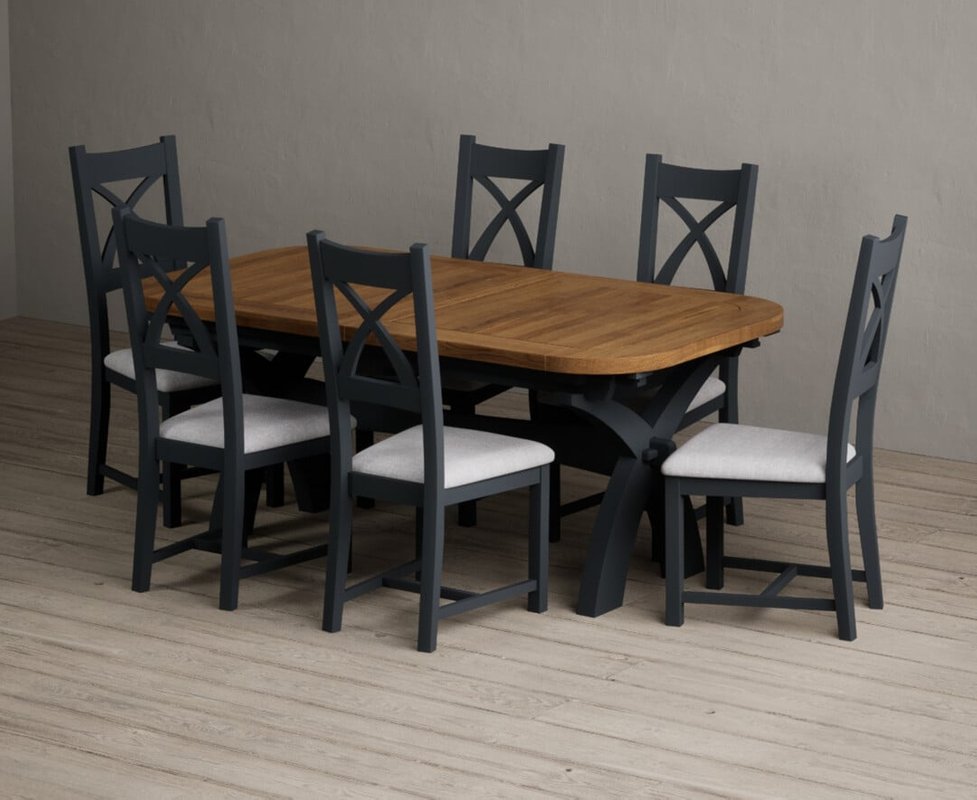 Photo of Extending olympia 180cm oak and dark blue painted dining table with 12 blue painted chairs Photo of Extending olympia 180cm oak and dark blue painted dining table with 12 blue painted chairs