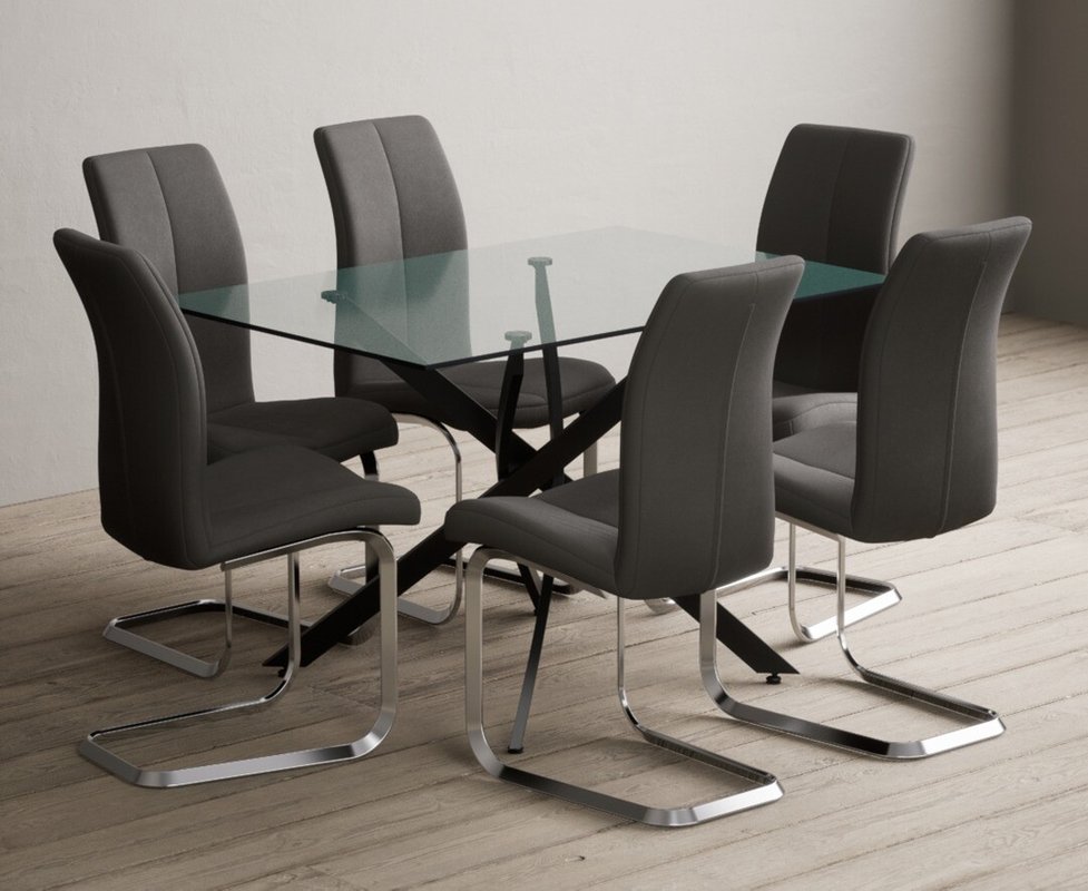 Photo of Bernini 120cm black leg rectangular glass dining table with 4 grey gianni chairs Photo of Bernini 120cm black leg rectangular glass dining table with 4 grey gianni chairs