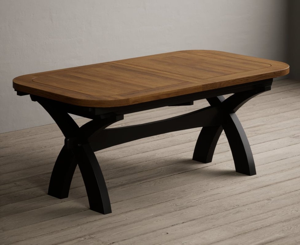 Photo of Extending olympia 180cm oak and black painted dining table Photo of Extending olympia 180cm oak and black painted dining table