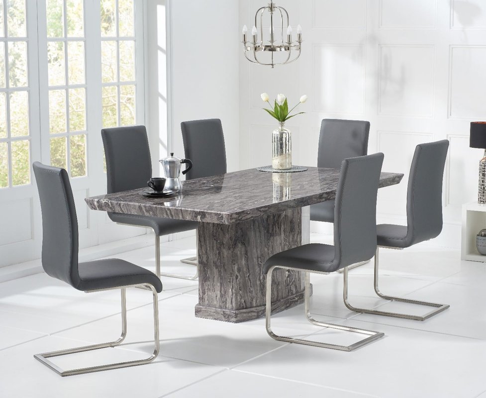 Photo of Carvelle 200cm grey pedestal marble dining table with 10 black austin chairs Photo of Carvelle 200cm grey pedestal marble dining table with 10 black austin chairs