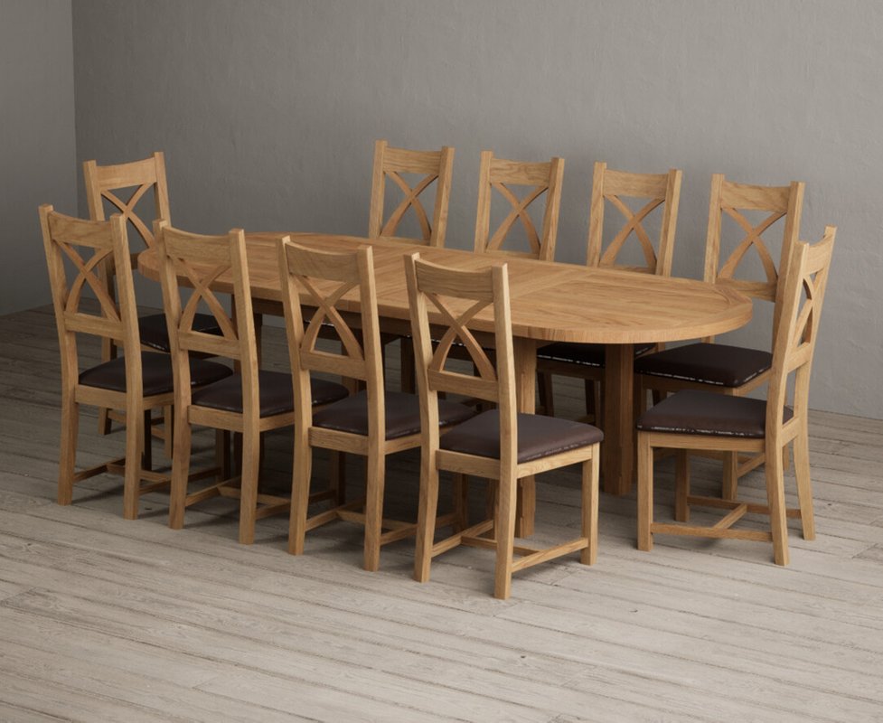 Photo 1 of Extending caversham oak oval dining table with 10 brown natural solid oak chairs Photo 1 of Extending caversham oak oval dining table with 10 brown natural solid oak chairs