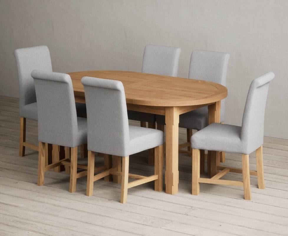 Photo of Extending caversham oak oval dining table with 8 blue braced chairs Photo of Extending caversham oak oval dining table with 8 blue braced chairs
