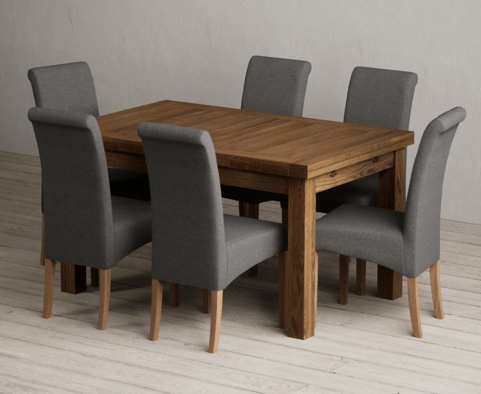 Photo of Extending buxton 140cm rustic solid oak dining table with 6 charcoal grey scroll back chairs Photo of Extending buxton 140cm rustic solid oak dining table with 6 charcoal grey scroll back chairs
