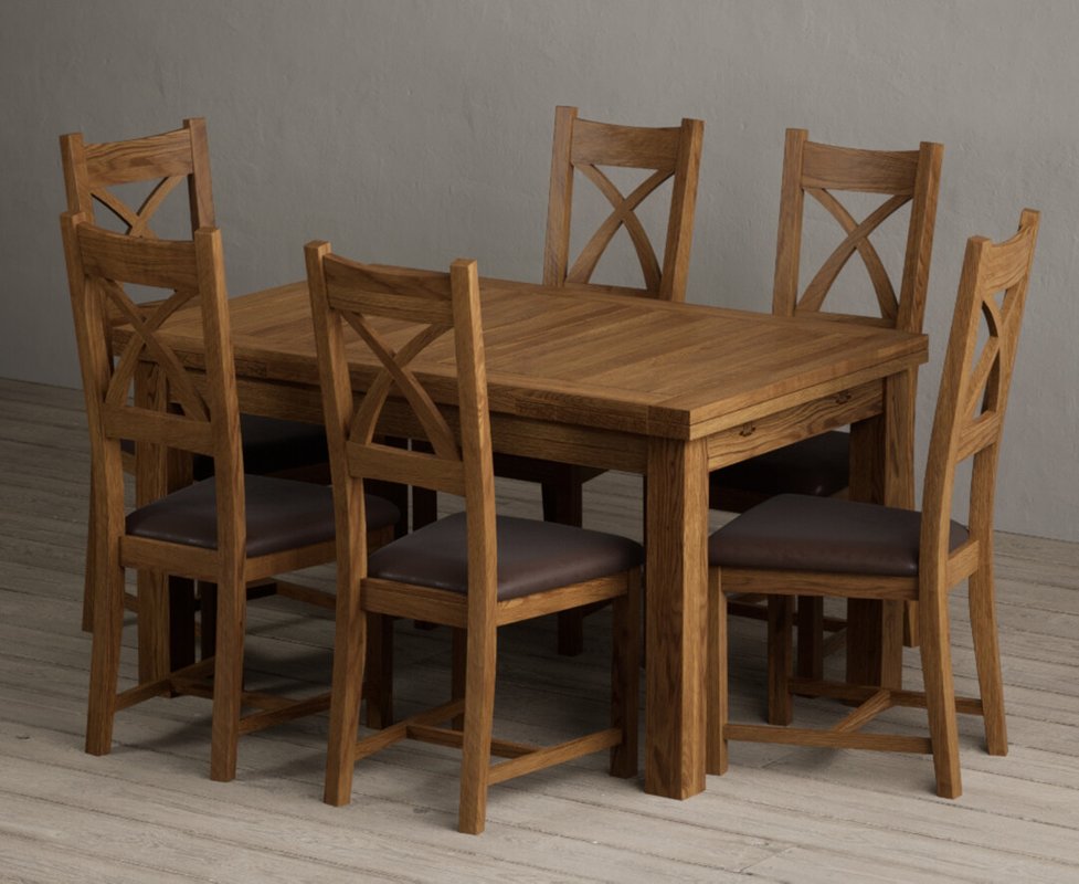 Photo 1 of Extending buxton 140cm rustic solid oak dining table with 6 brown rustic solid oak chairs Photo 1 of Extending buxton 140cm rustic solid oak dining table with 6 brown rustic solid oak chairs
