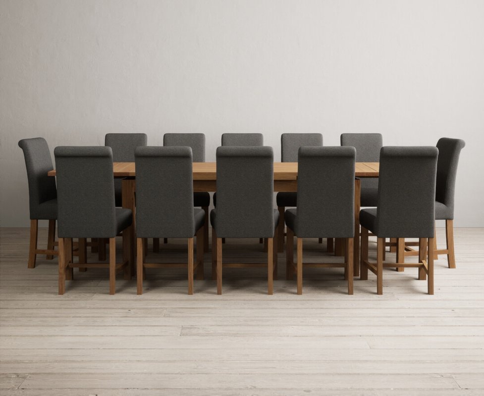 Photo 1 of Extending buxton 180cm solid oak dining table with 12 charcoal grey braced chairs Photo 1 of Extending buxton 180cm solid oak dining table with 12 charcoal grey braced chairs