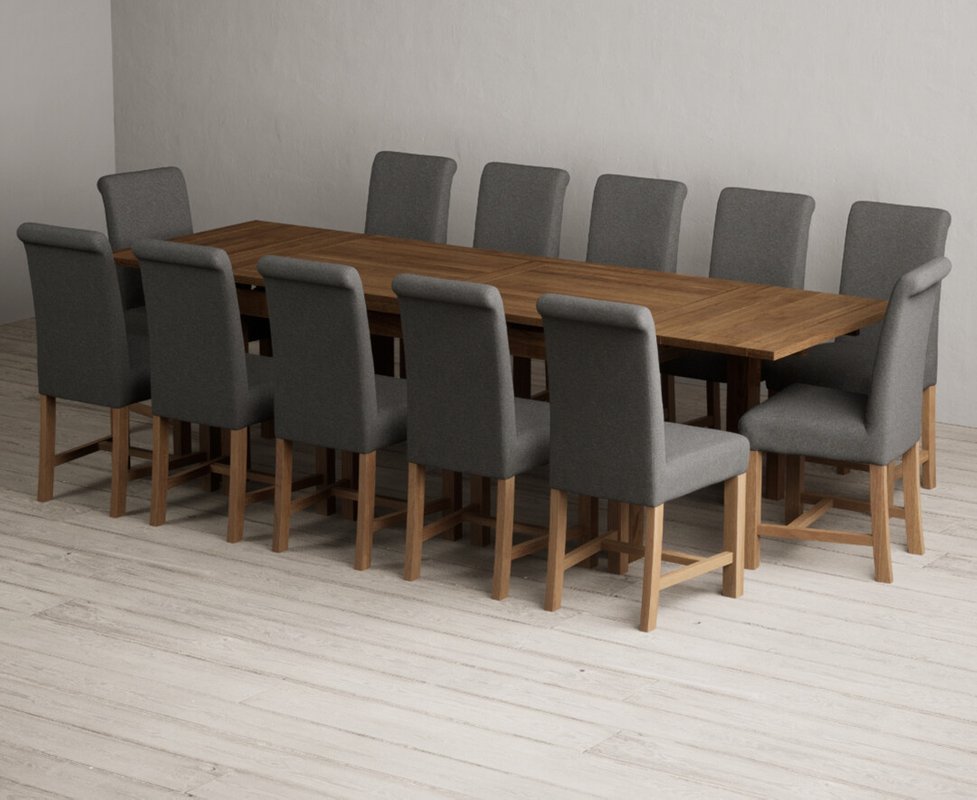 Photo 1 of Extending buxton 180cm rustic solid oak dining table with 12 charcoal grey braced chairs Photo 1 of Extending buxton 180cm rustic solid oak dining table with 12 charcoal grey braced chairs