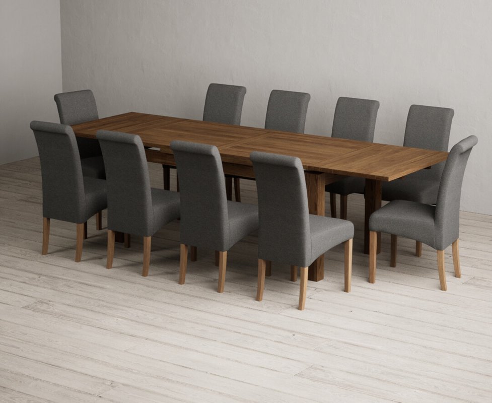 Photo 1 of Extending buxton 180cm rustic solid oak dining table with 10 charcoal grey scroll back chairs Photo 1 of Extending buxton 180cm rustic solid oak dining table with 10 charcoal grey scroll back chairs
