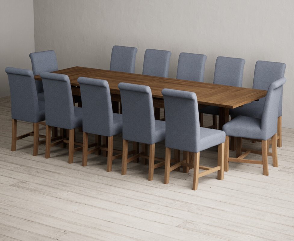 Photo 1 of Extending buxton 180cm rustic solid oak dining table with 12 blue braced chairs Photo 1 of Extending buxton 180cm rustic solid oak dining table with 12 blue braced chairs